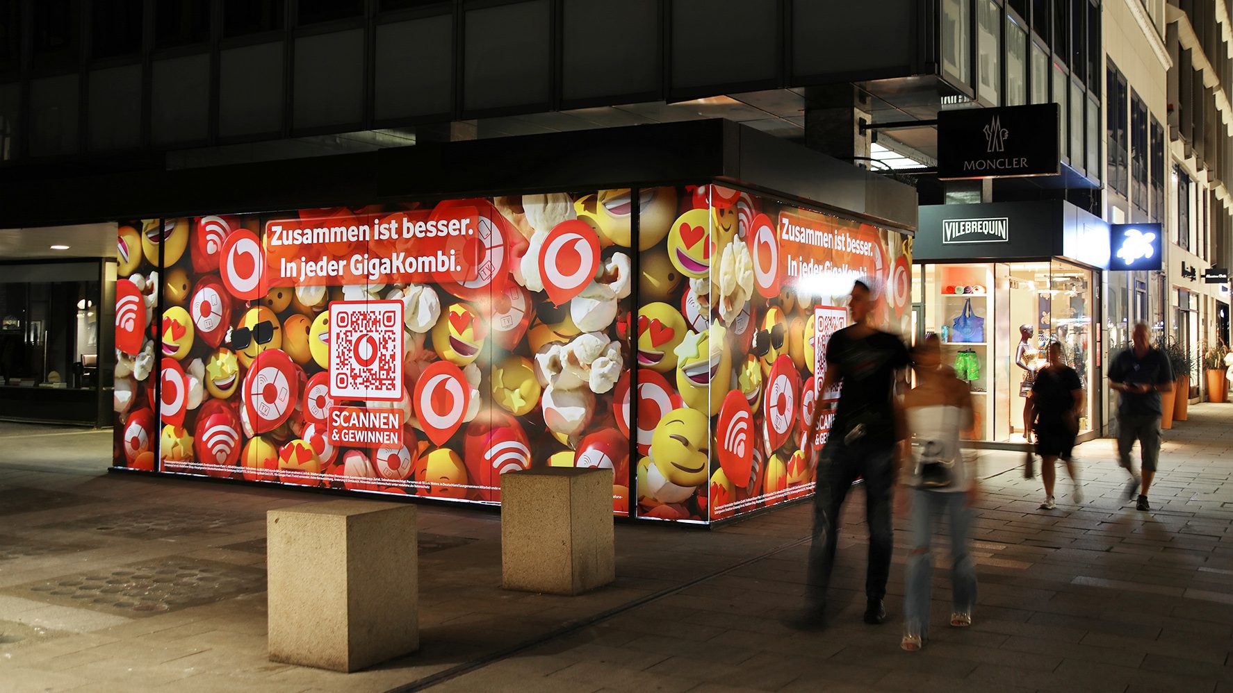 DOOH advertising media on the street with Vodafone advertising